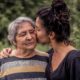 Family Caregiving: Daughter Kissing Mother